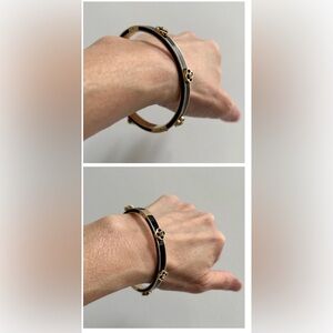 Henri Bendel Grey and Goldtone Bangle Swarovski embedded Clovers